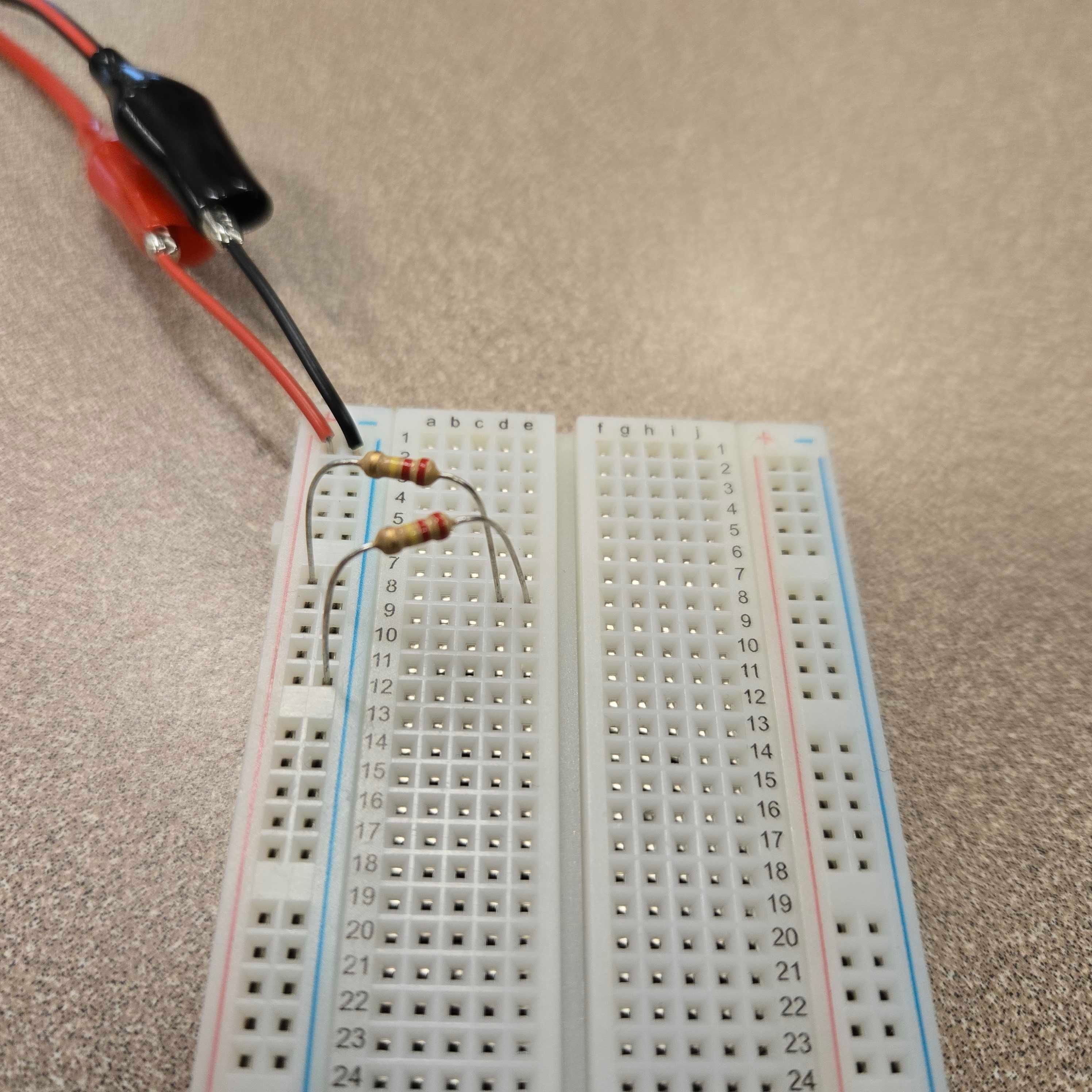 Two resistors in series making a voltage divider