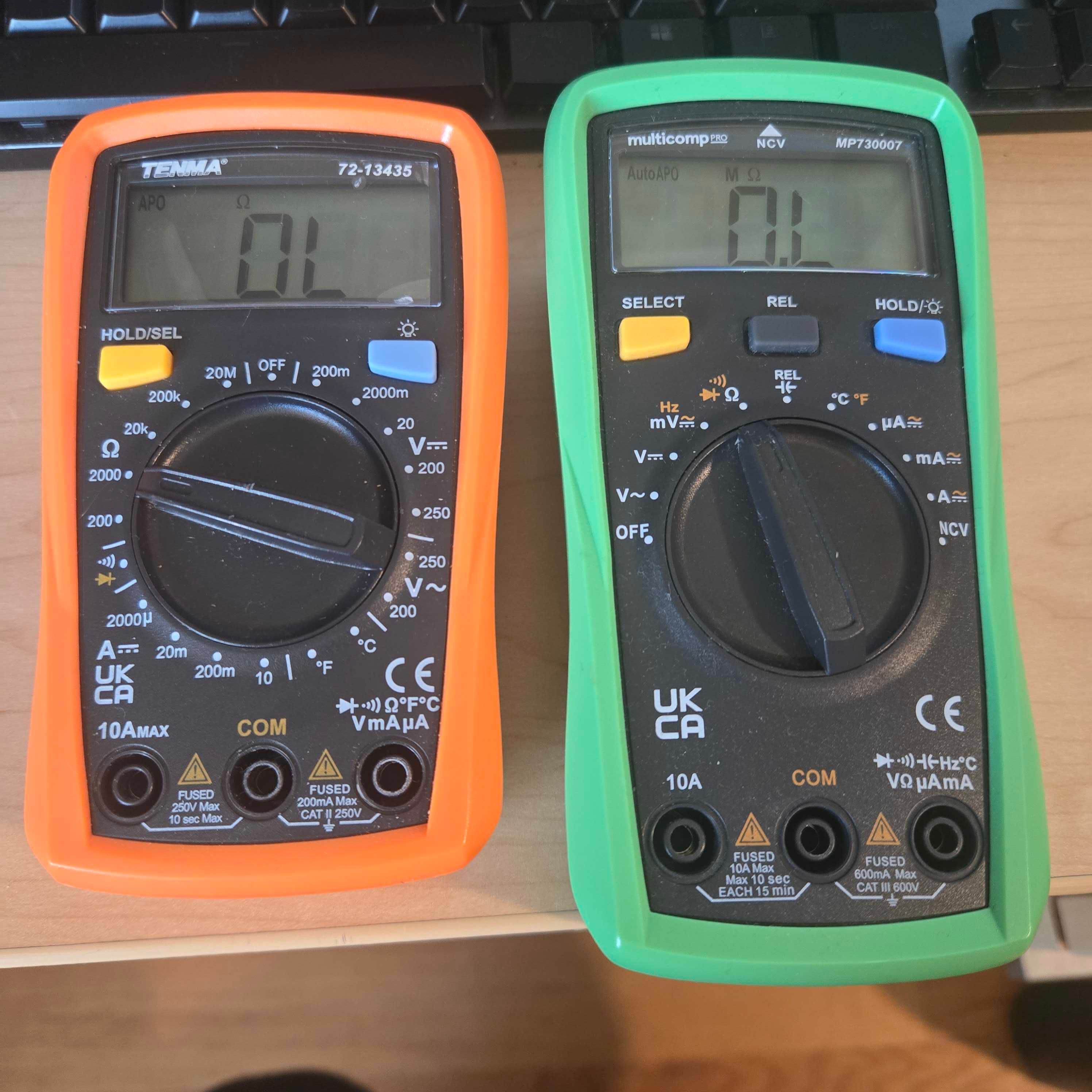 Two models of multimeter set to measure resistance
