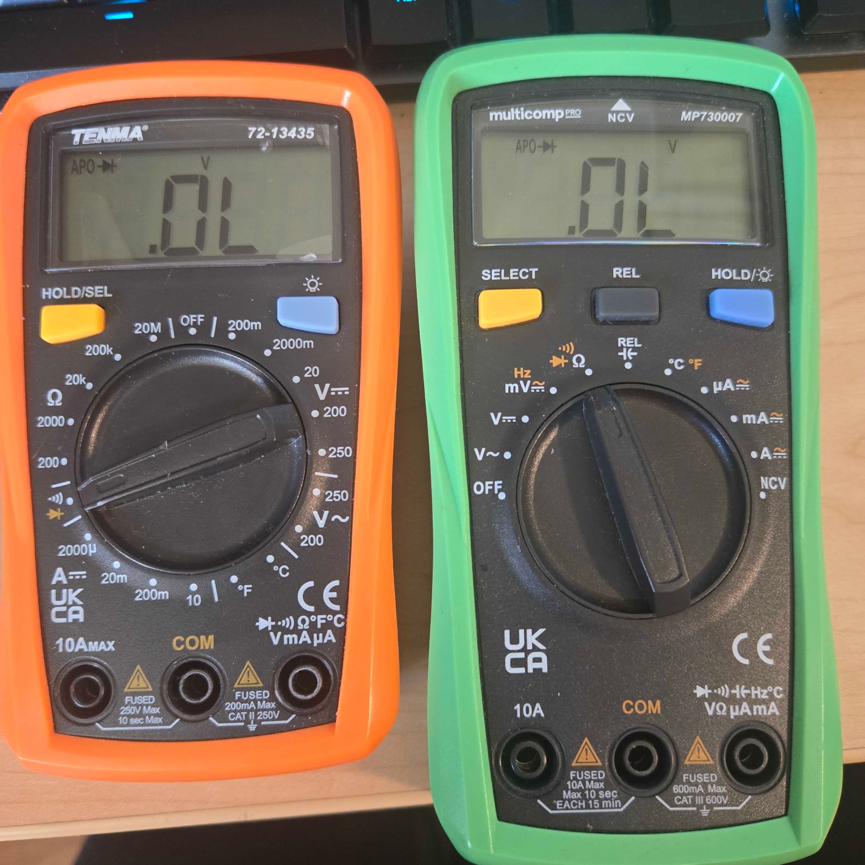 Two models of multimeter set to detect continuity